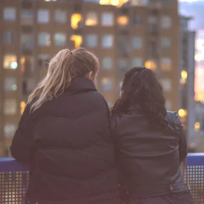 two women on a date on a balcony with things to talk about